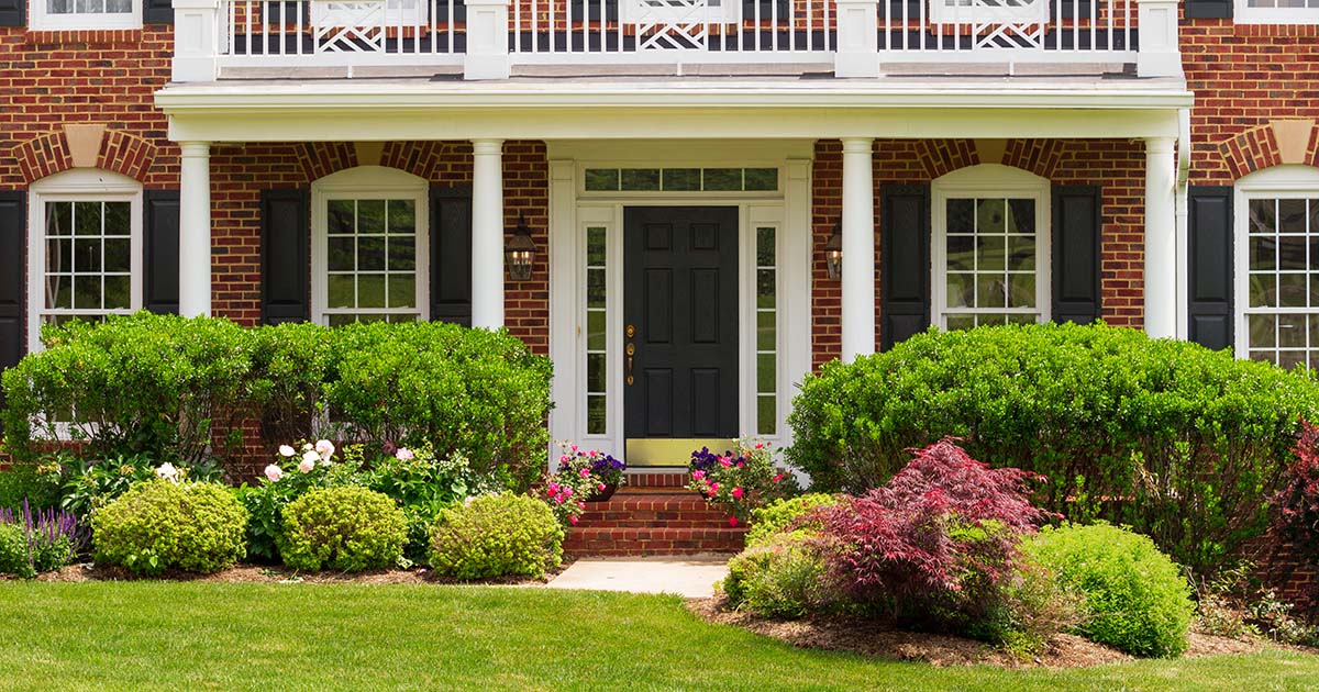 Front yard of a house with beautiful landscaping